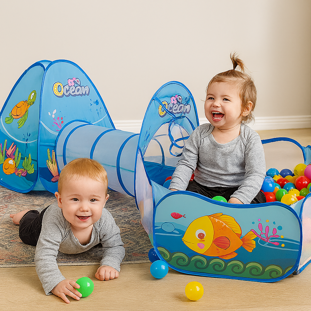 Two children playing with an ocean-themed play tent and ball pit.