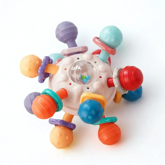 Colorful baby toy with various shapes and textures on a white background